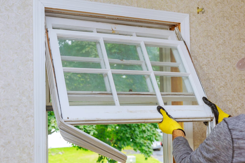 Master removes old home repairs, replacement windows